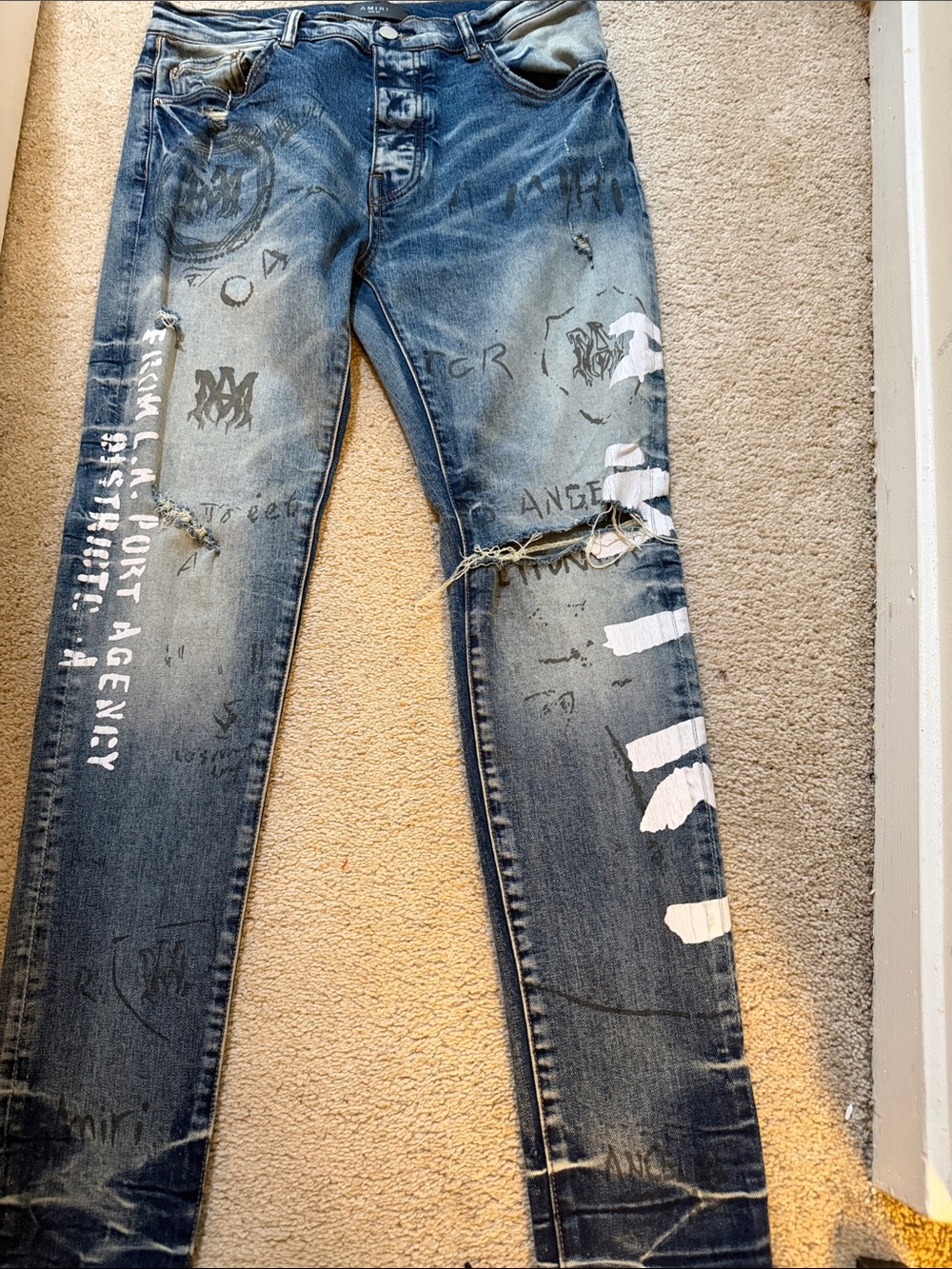 AMIRI Distressed Blue Graphic Skinny Jeans